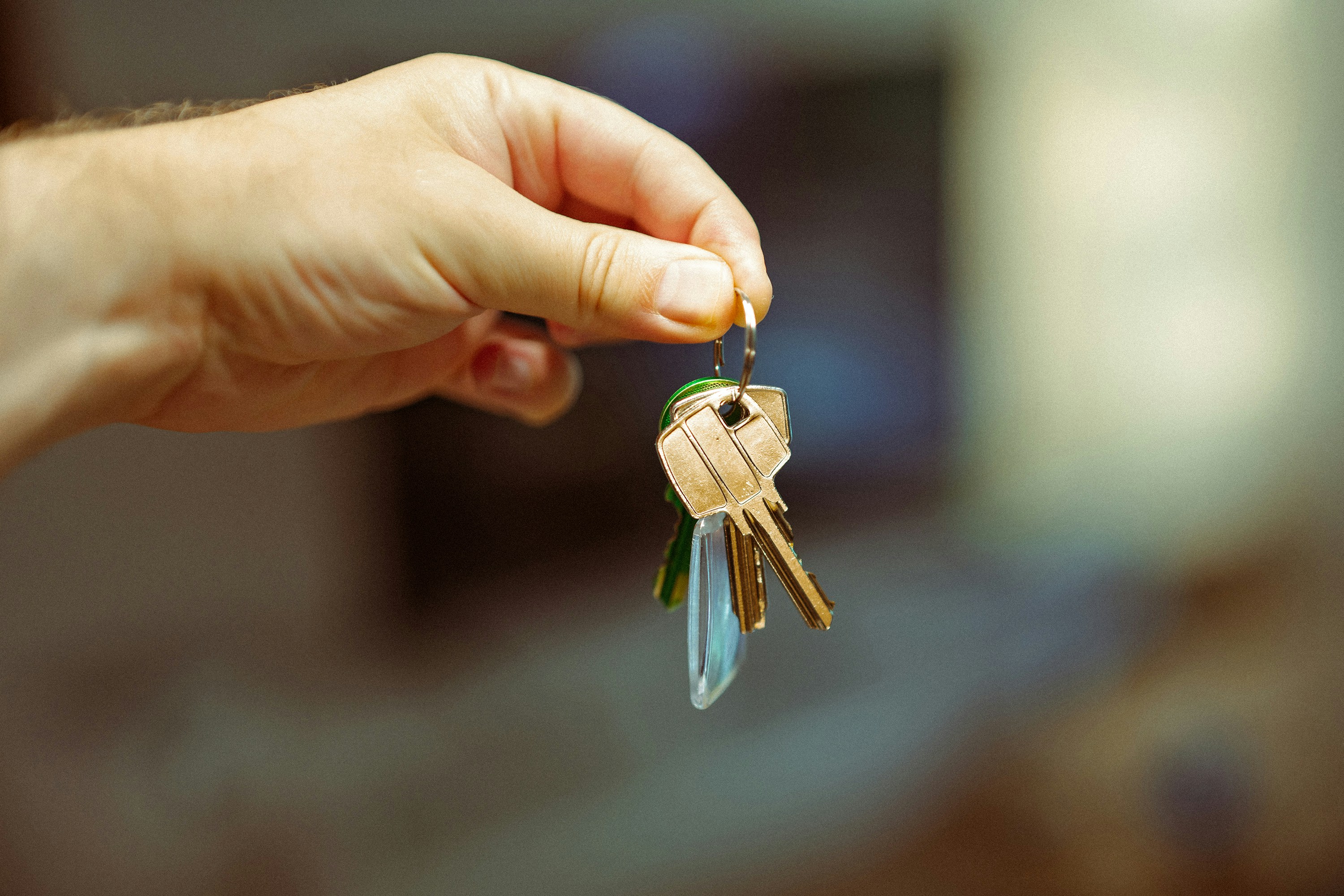 Close-up of property keys representing lease management and tenant key exchange for co-living properties